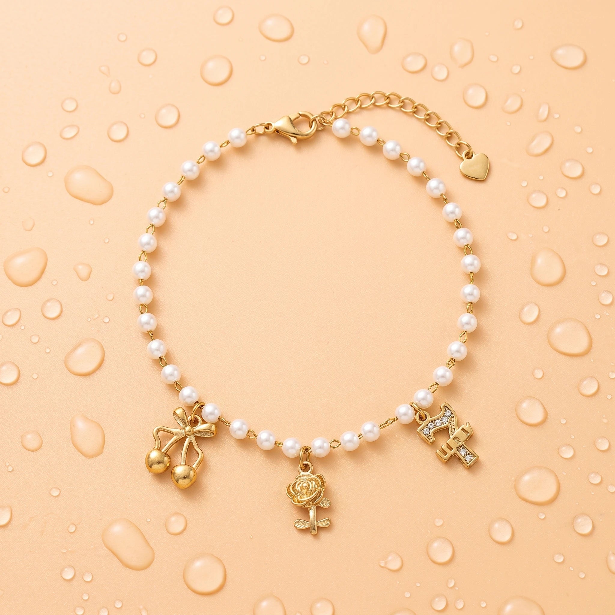 QIAOREN 13334 Coquette Pearl Anklet with Cherry Bow, Metal Rose & Rhinestone Letter Charms, Elegant Sweet Foot Jewelry Gift