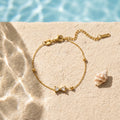 QIAOREN 13360 Gold Plated Stainless Steel CZ Bow Bracelet Dainty Minimalist Chain Jewelry for Women