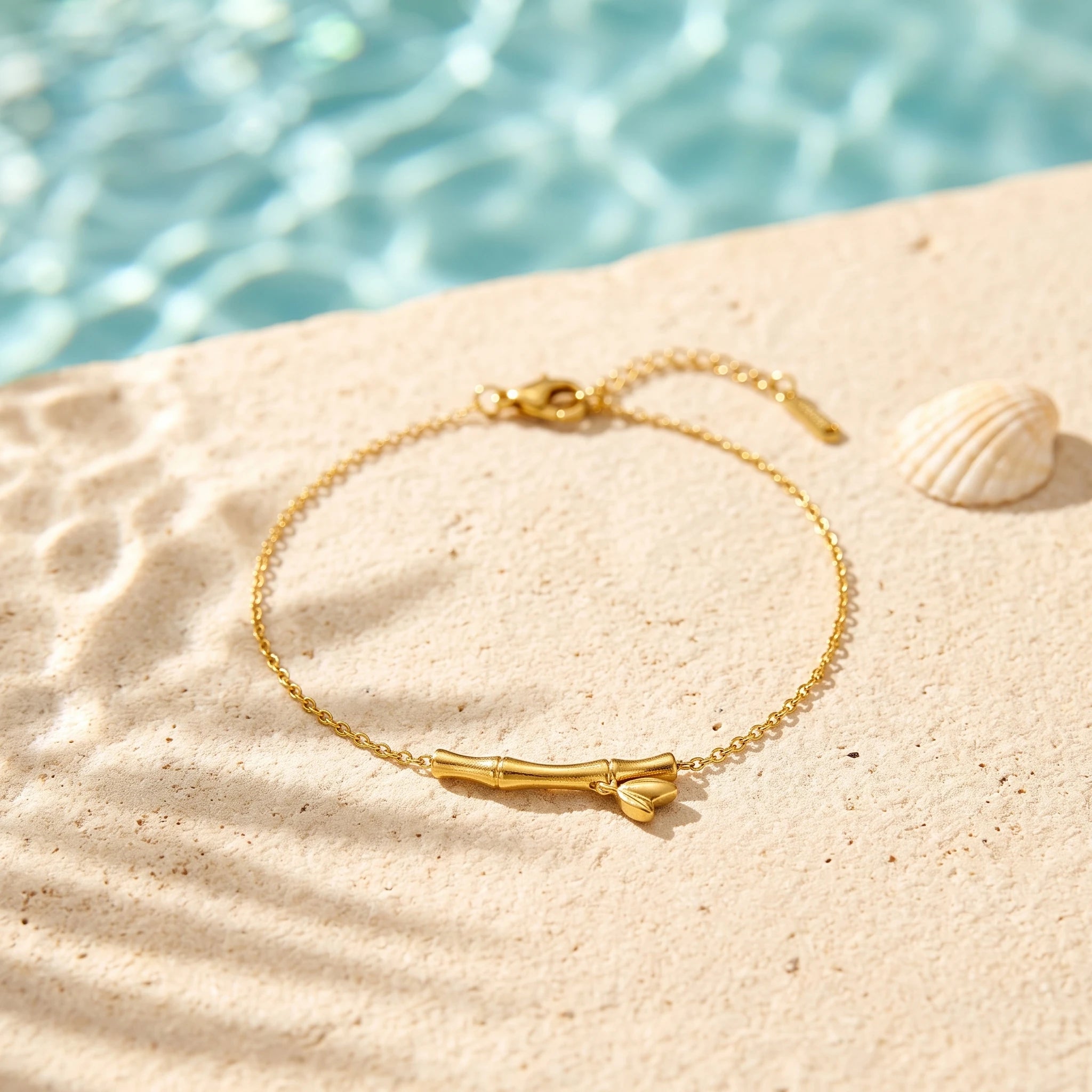 QIAOREN 13769 Thin Oval Link Adjustable Anklet with Matte Textured Bamboo Bar Charm with Tiny Leaf Detail