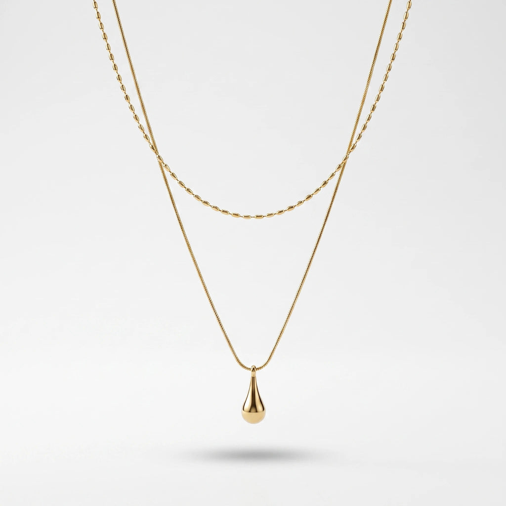 QIAOREN 13532 Double Layer Droplet Pendant Stack Necklace with Rice Bead & Thin Snake Chain, Smooth Teardrop Gold Charm