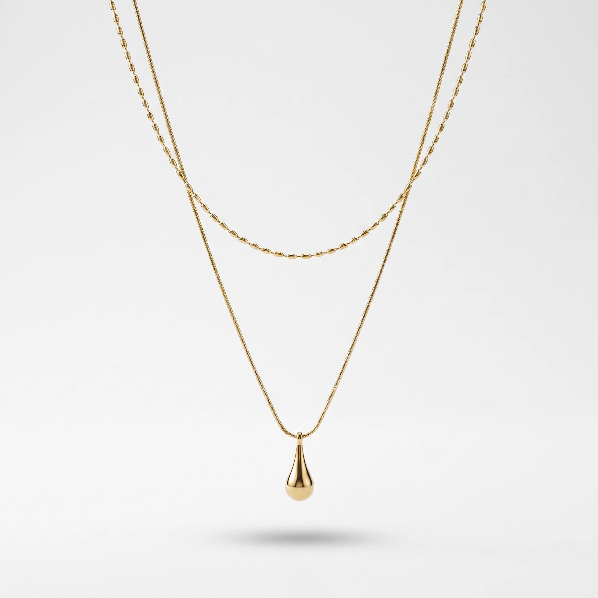 QIAOREN 13532 Double Layer Droplet Pendant Stack Necklace with Rice Bead & Thin Snake Chain, Smooth Teardrop Gold Charm
