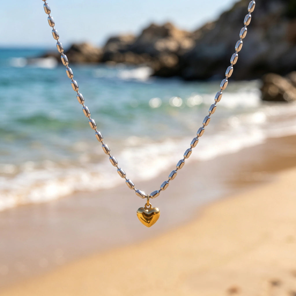 QIAOREN 13995 Two Tone Oval Rice Bead Chain Necklace with Puffy Solid Gold Heart Pendant, Silver Chain & Gold Charm Contrast