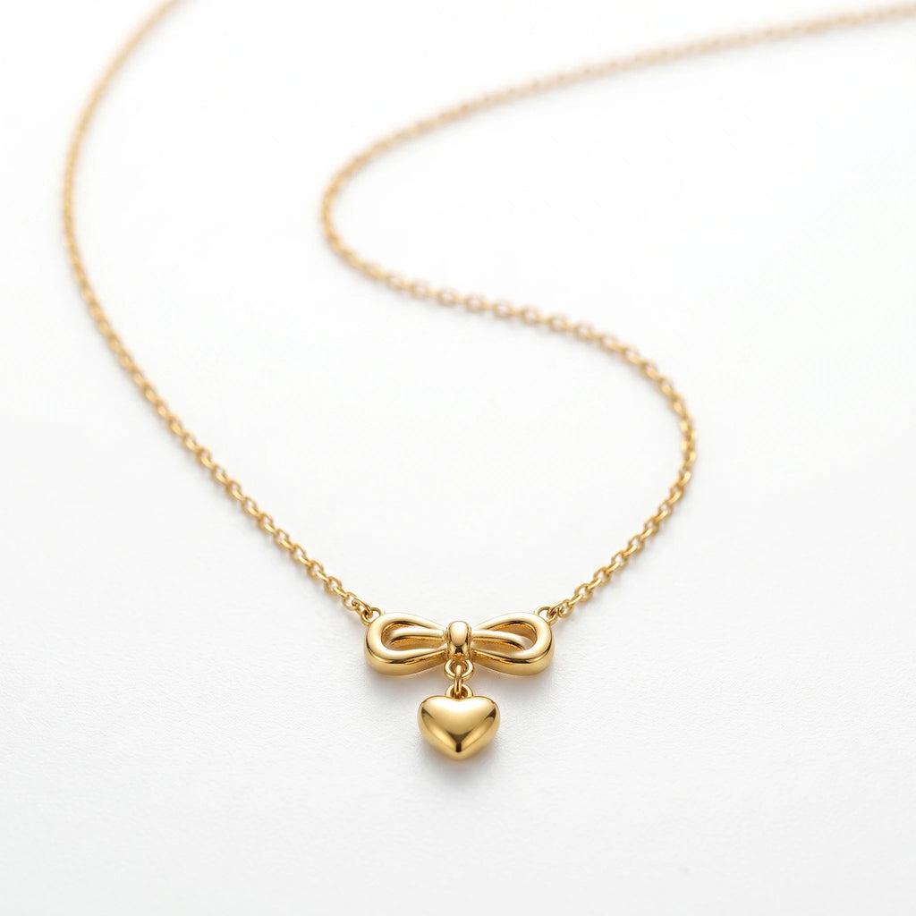 QIAOREN 13499 Coquette Style Bow Drop Heart Pendant Necklace, Dainty Thin Oval Cable Chain Gold Neck Jewelry Gift