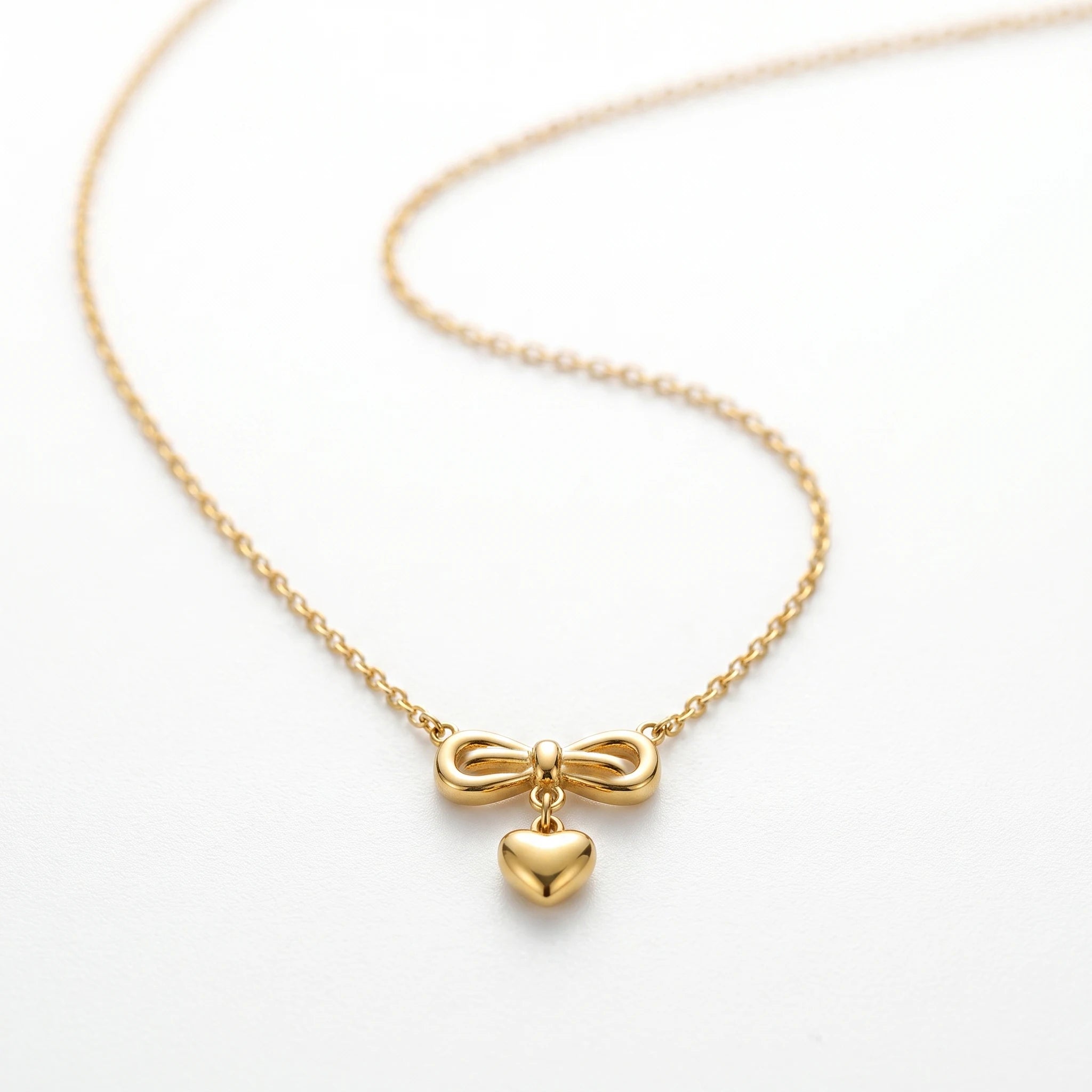 QIAOREN 13499 Coquette Style Bow Drop Heart Pendant Necklace, Dainty Thin Oval Cable Chain Gold Neck Jewelry Gift