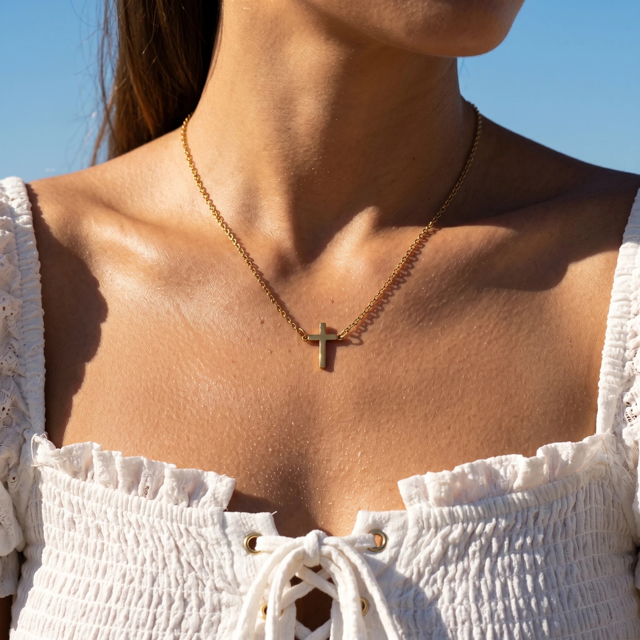 QIAOREN 10539 Trendy Women's Stainless Steel Gold Plated Cross Pendant Necklace with Vertical Cross Design