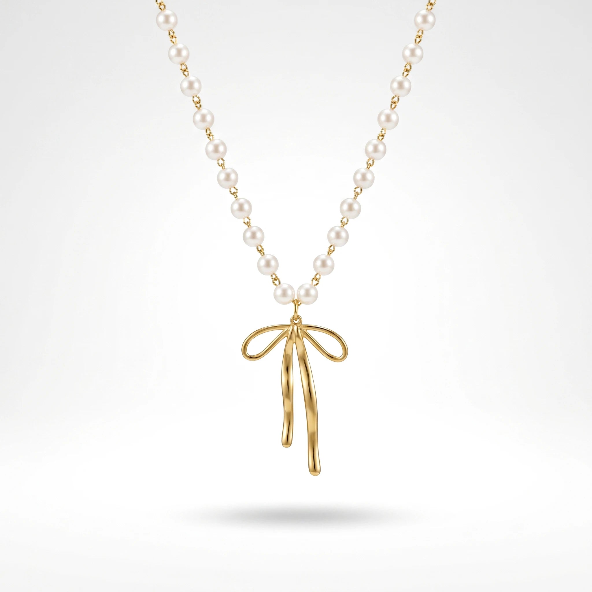 QIAOREN 11963 Wholesale 18K Gold Plated Stainless Steel Necklace Elegant Long Tail Bowknot Pendant Imitation Pearl