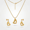 QIAOREN 11065 Premium Gold Hollow Heart Pendant Set Stainless Steel Elegant Jewelry for Women and Girls