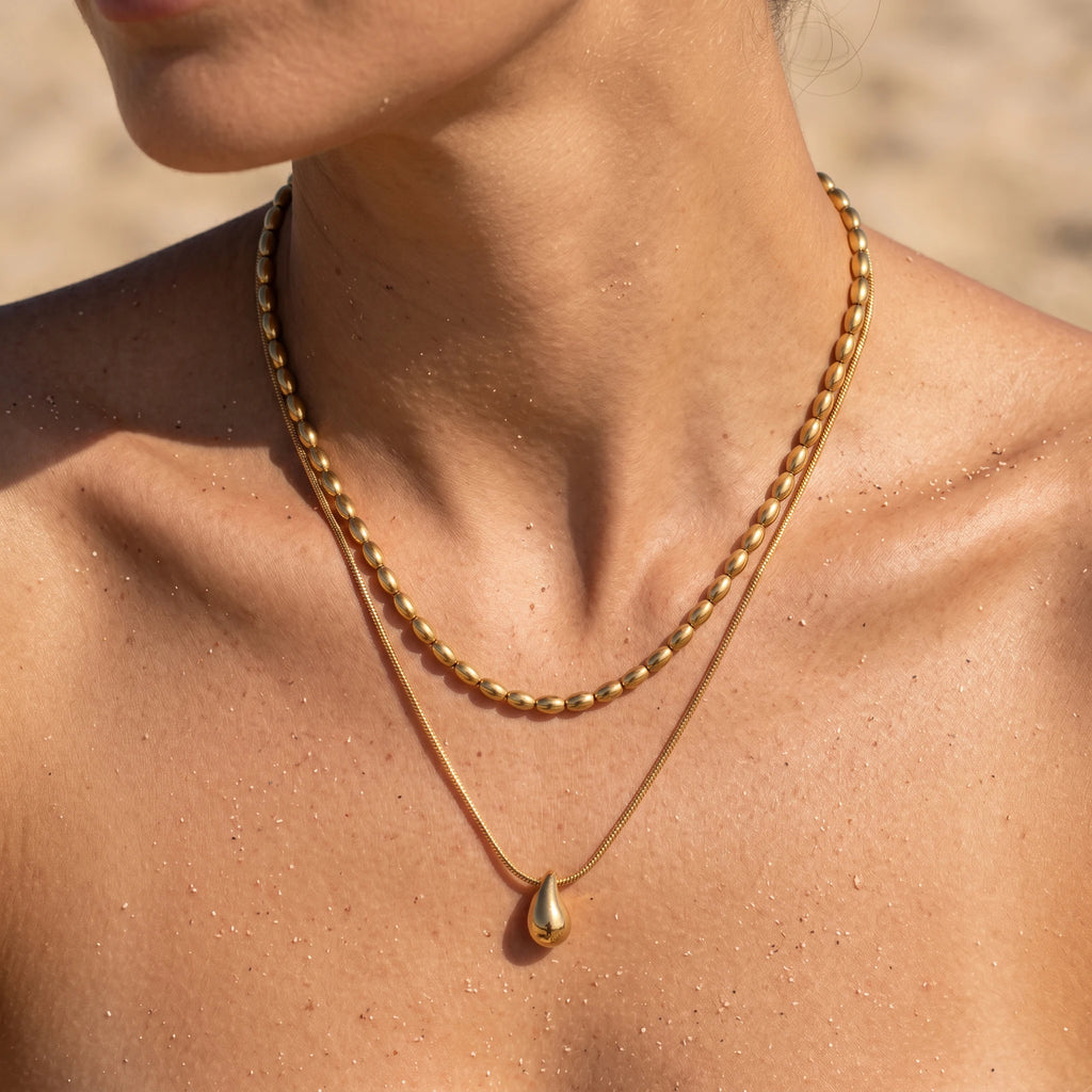 QIAOREN 11075 Stainless Steel Double Layer Necklace Rice Bead Snake Chain Teardrop Pendant Adjustable Gold Women Jewelry Gift