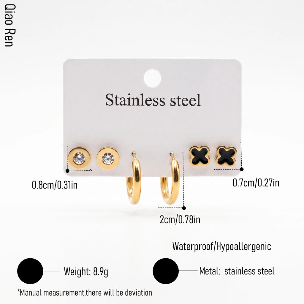 QIAOREN 14472 3 Pair Gold Stainless Steel Earrings Set, Round Disc CZ Studs, Black Enamel Clover Studs & Smooth Huggie Hoops