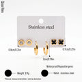 QIAOREN 14472 3 Pair Gold Stainless Steel Earrings Set, Round Disc CZ Studs, Black Enamel Clover Studs & Smooth Huggie Hoops
