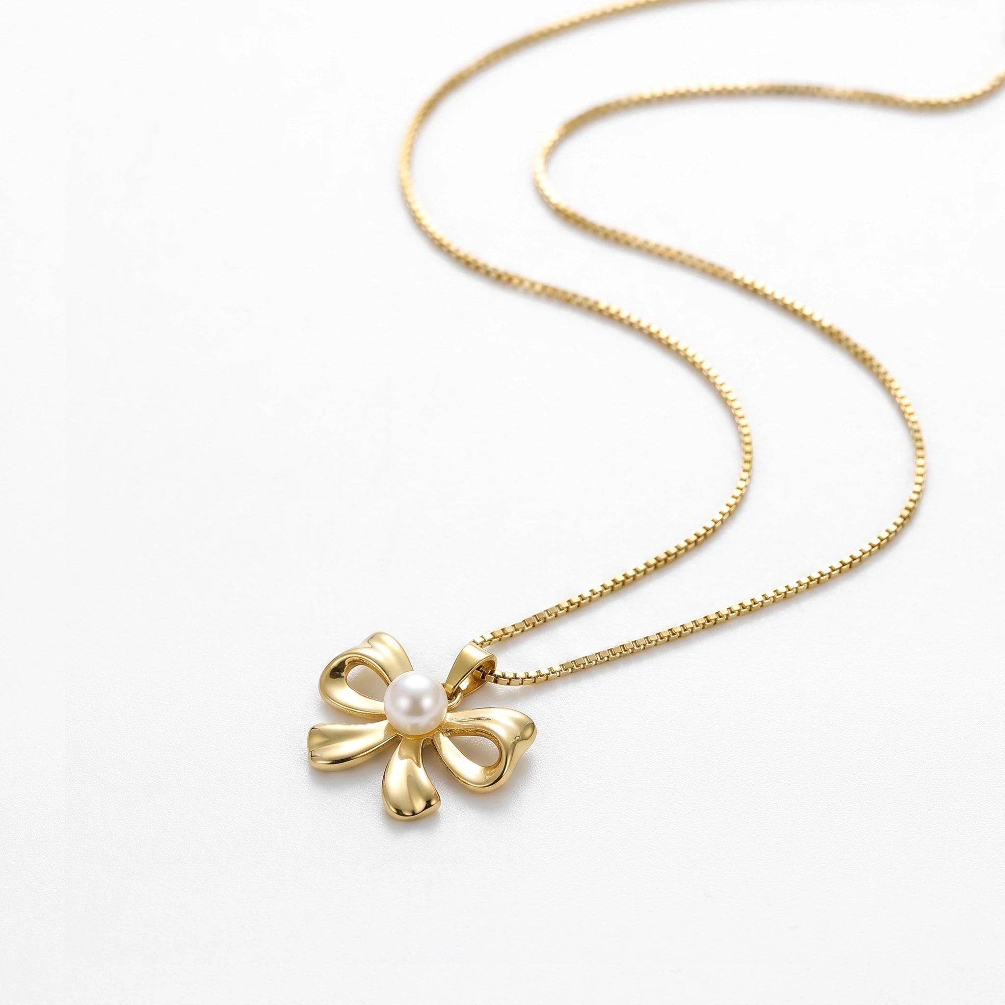 QIAOREN 13938 Thin Box Snake Chain Pendant Necklace with Polished Bow Knot Charm & Center Smooth White Pearl Inlay