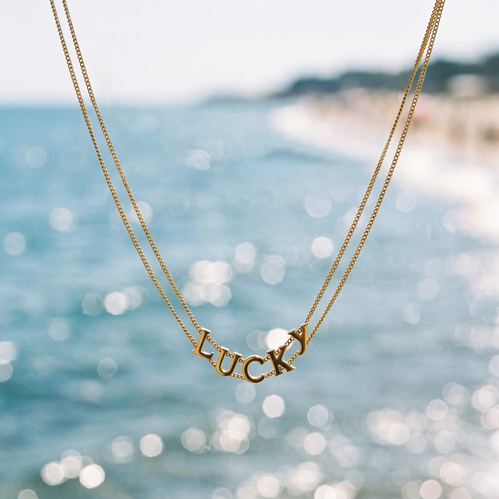 QIAOREN 13808 Double Layer Thin Curb Chain Pendant Necklace with Curved Cutout LUCKY Letter Charm, Polished Gloss Gold