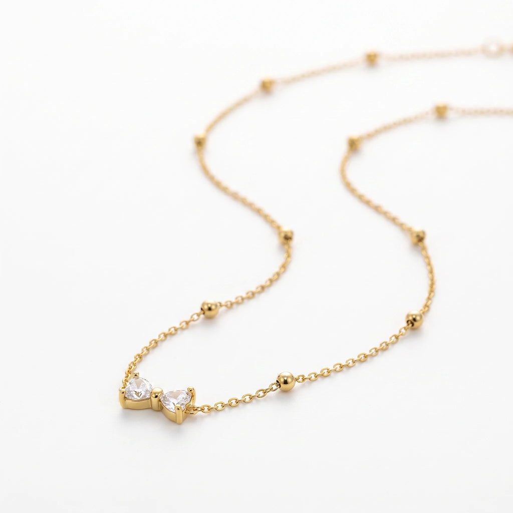 QIAOREN 13509 Dainty Crystal Bow Pendant Station Necklace with Round Beaded Thin Cable Chain, Gold Mini Bowknot CZ Necklace