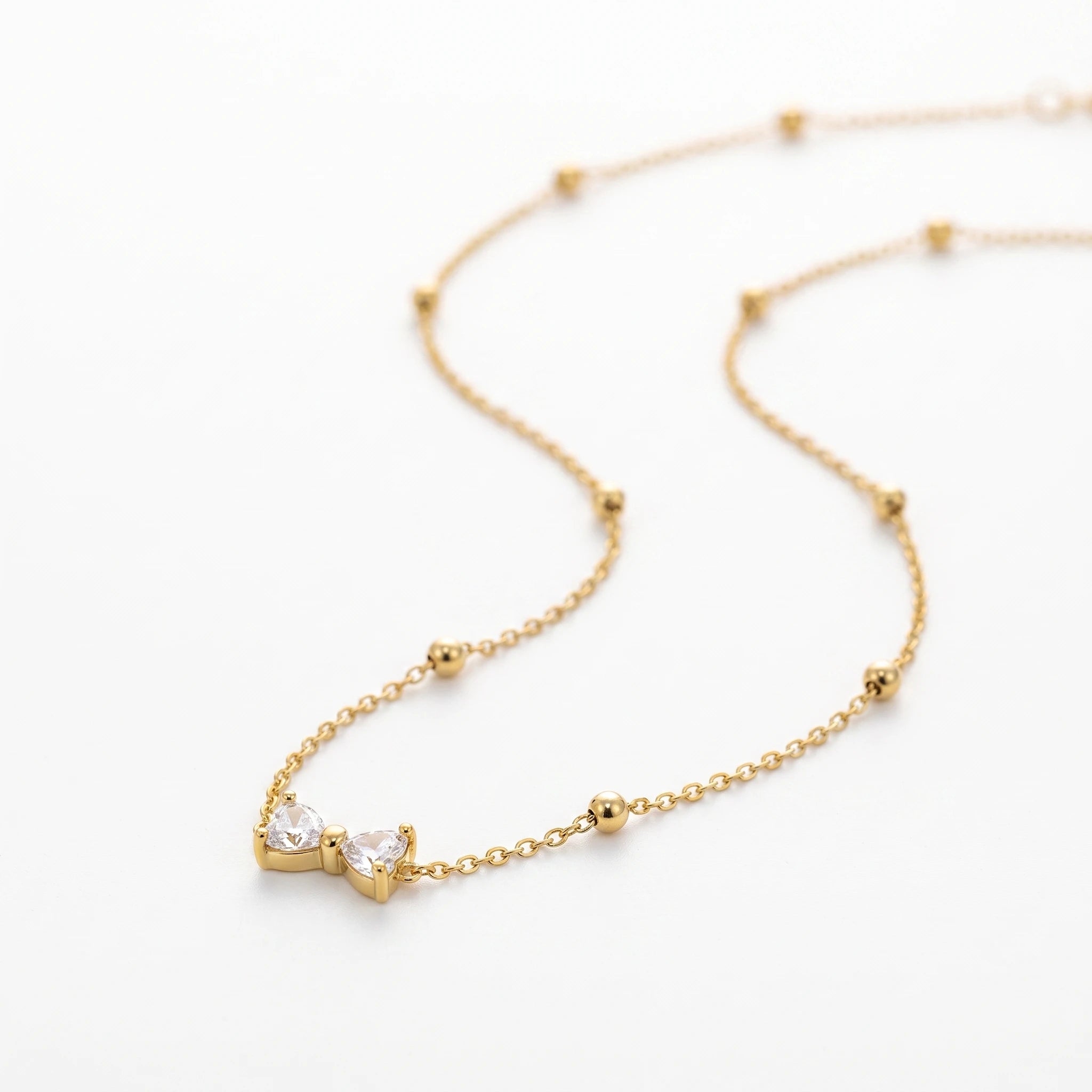 QIAOREN 13509 Dainty Crystal Bow Pendant Station Necklace with Round Beaded Thin Cable Chain, Gold Mini Bowknot CZ Necklace