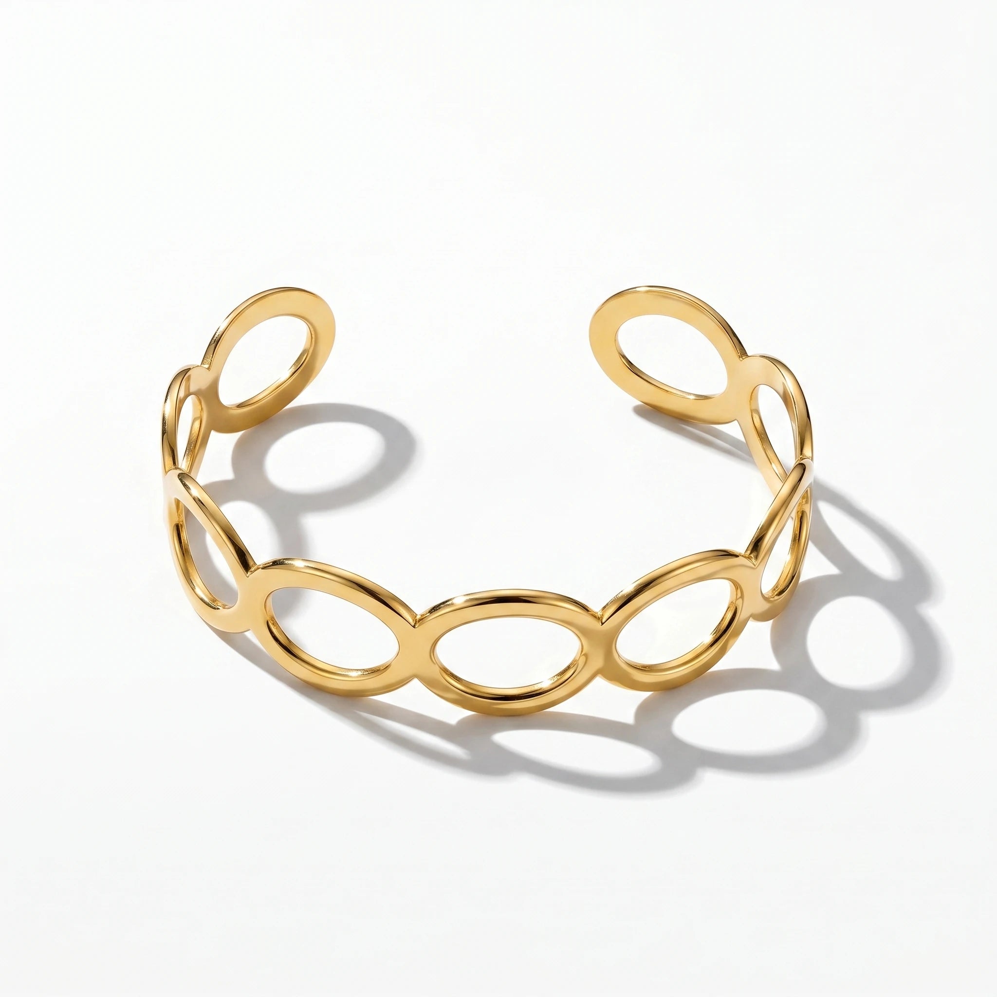 QIAOREN 12706 Minimalist Interlocked Ellipse Cutout Wide Cuff Bangle Hypoallergenic Stainless Steel Gold Bracelet Party Gift