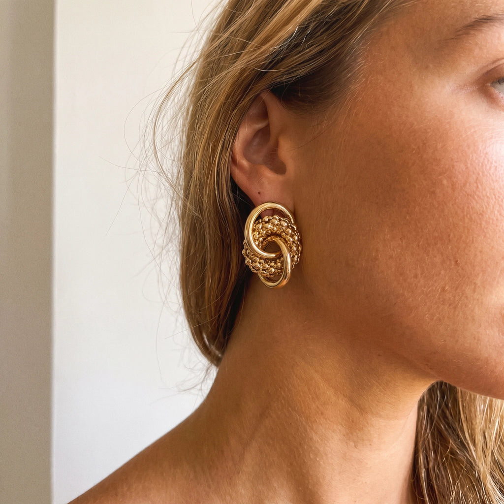 QIAOREN 14537 Beaded Interlocking Knot Stud Earrings, Textured Gold Metal Earrings, Hypoallergenic Statement Jewelry Gift