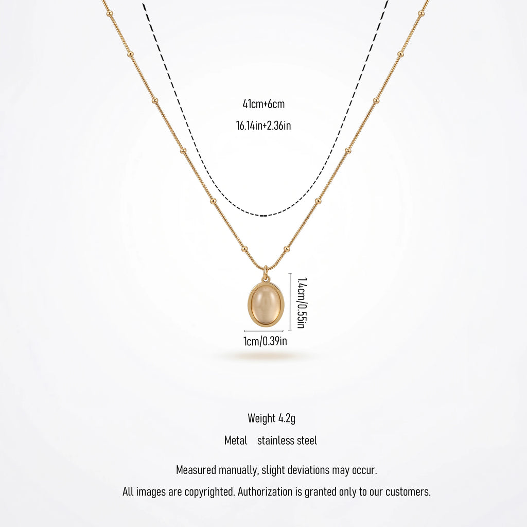 QIAOREN 13510 Dainty Beaded Snake Chain Oval Cream Cat Eye Pendant Necklace, Smooth Gold Frame Natural Stone Necklace