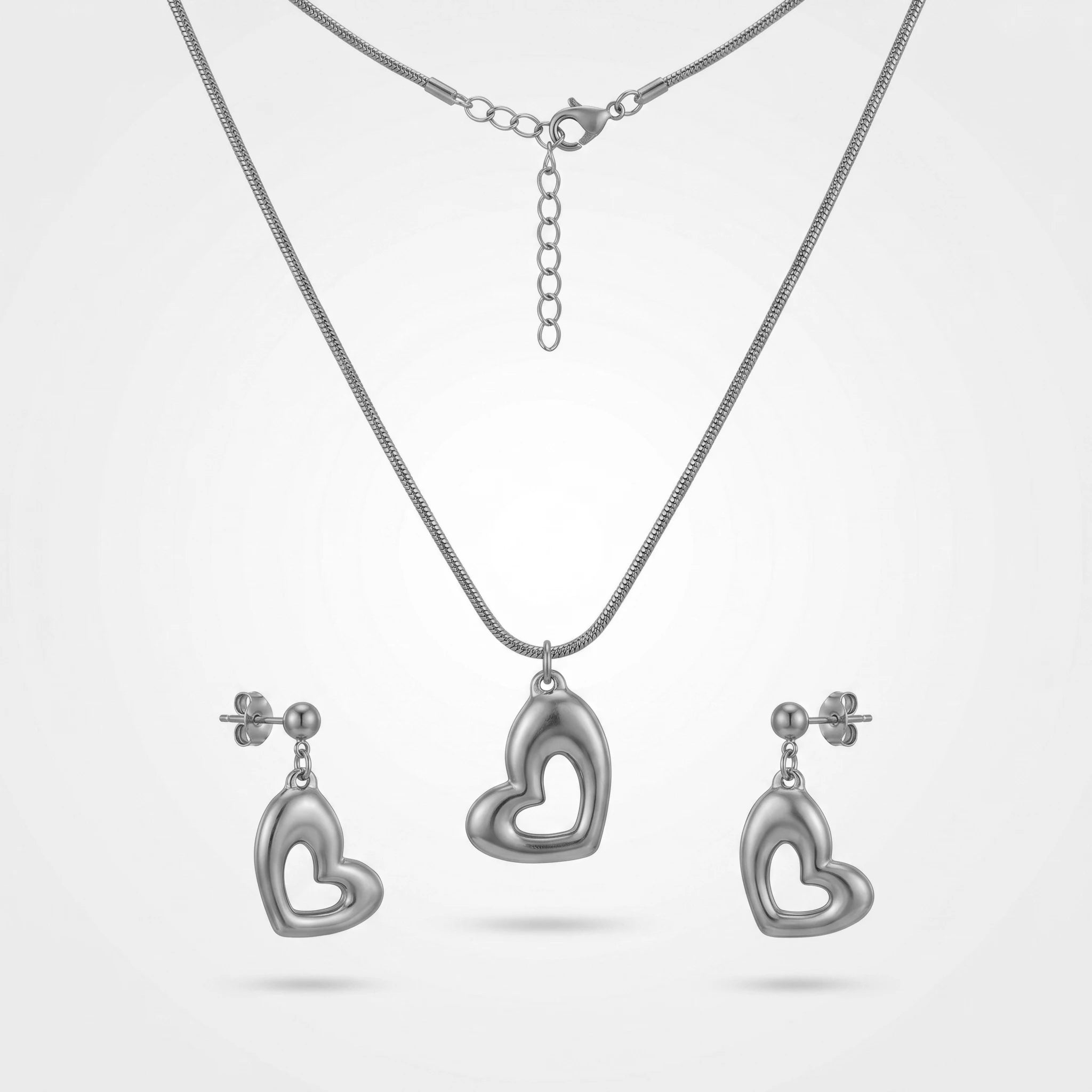 QIAOREN 11065 Premium Gold Hollow Heart Pendant Set Stainless Steel Elegant Jewelry for Women and Girls