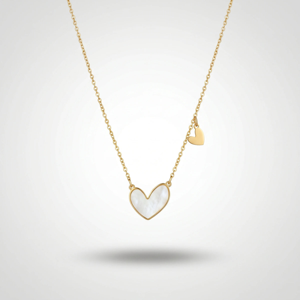 QIAOREN 11679 Dainty Mother of Pearl Heart Necklace 18K Gold Stainless Steel with Mini Heart Charm for Women