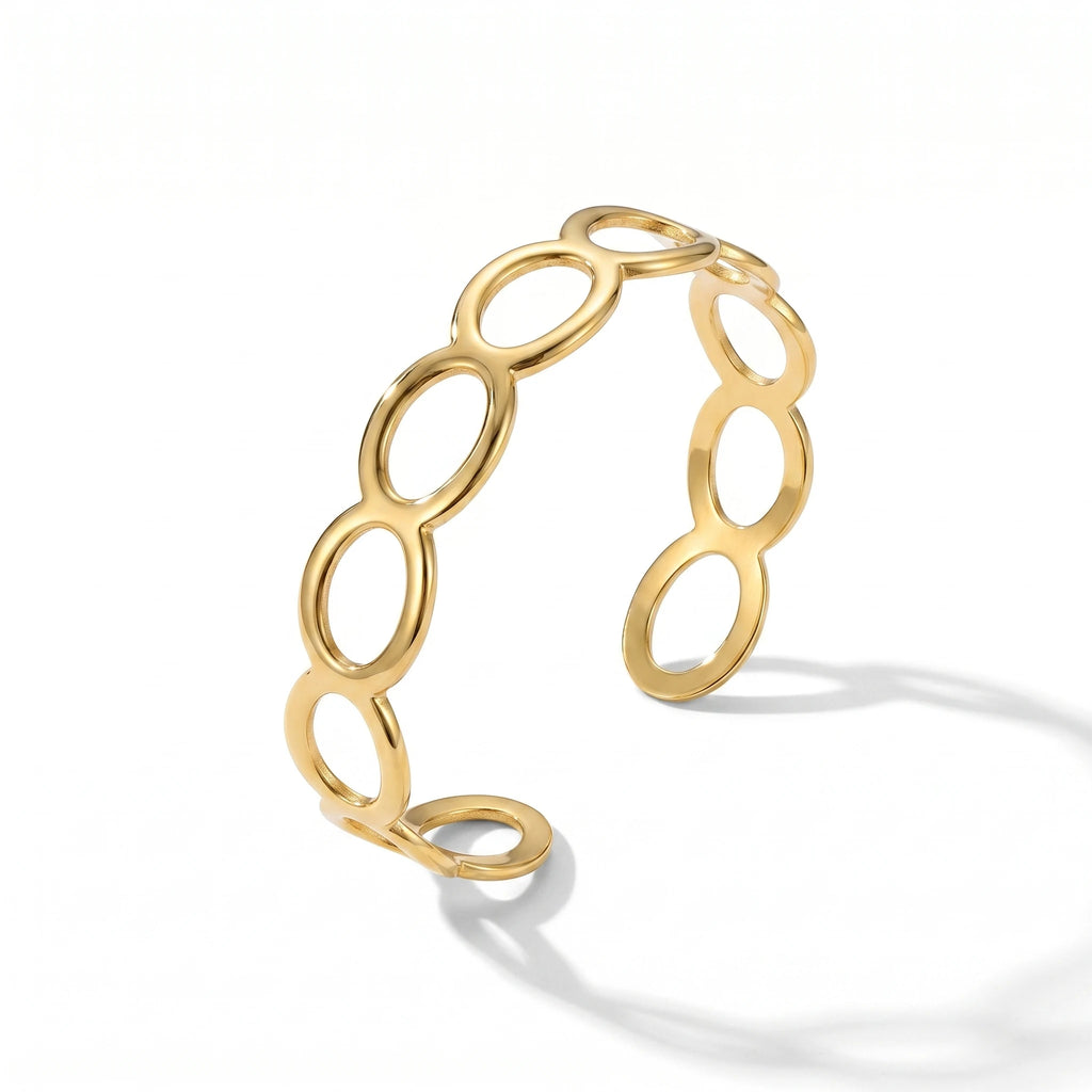 QIAOREN 12706 Minimalist Interlocked Ellipse Cutout Wide Cuff Bangle Hypoallergenic Stainless Steel Gold Bracelet Party Gift