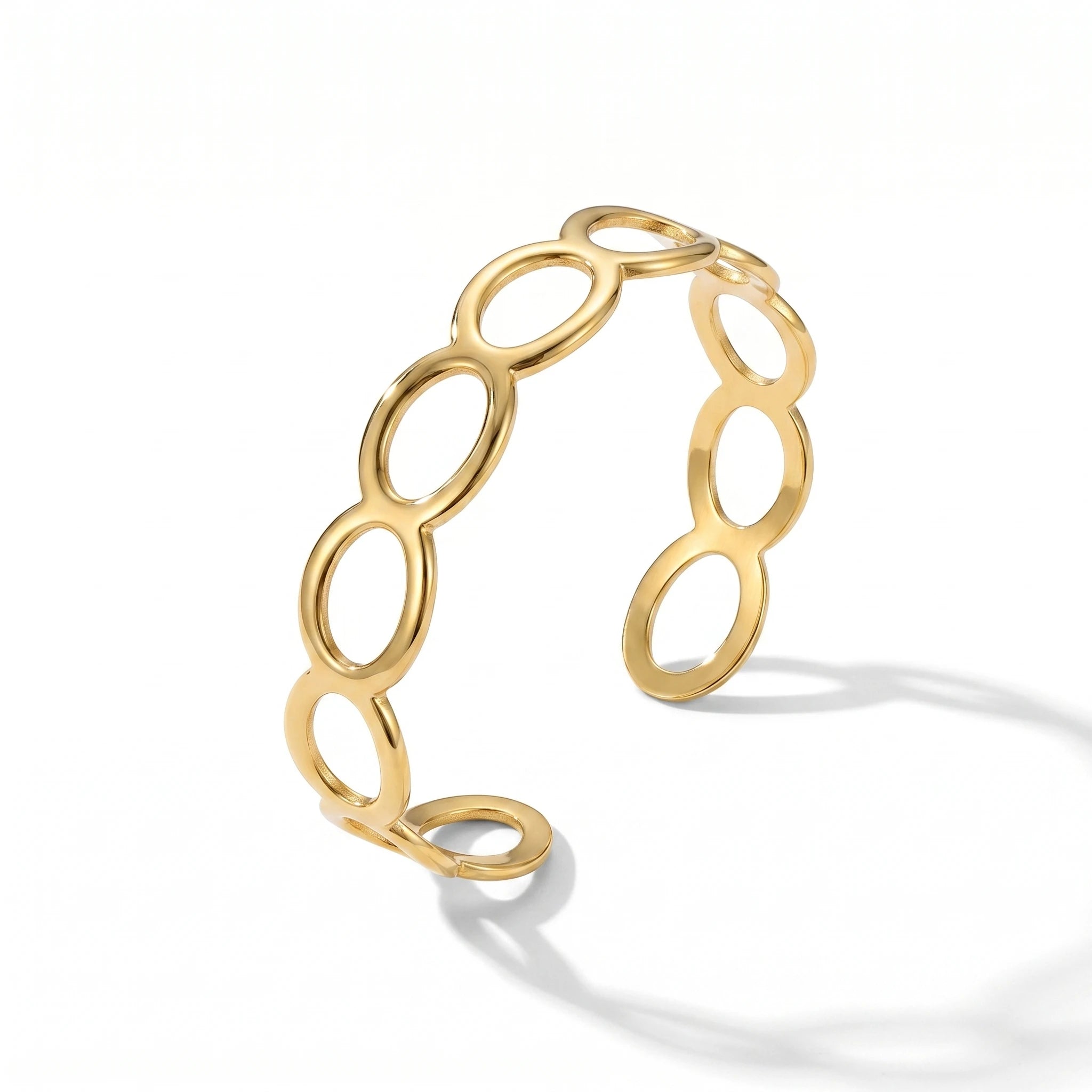 QIAOREN 12706 Minimalist Interlocked Ellipse Cutout Wide Cuff Bangle Hypoallergenic Stainless Steel Gold Bracelet Party Gift