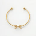 QIAOREN 11009 Cute Ribbon Bow Gold Bangle Stainless Steel Adjustable Bracelet for Summer Beach Vacation Style