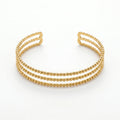 QIAOREN 10997 Modern Minimalist Gold Ball Bead Bracelet Stainless Steel Open Cuff Jewelry for Elegant Women