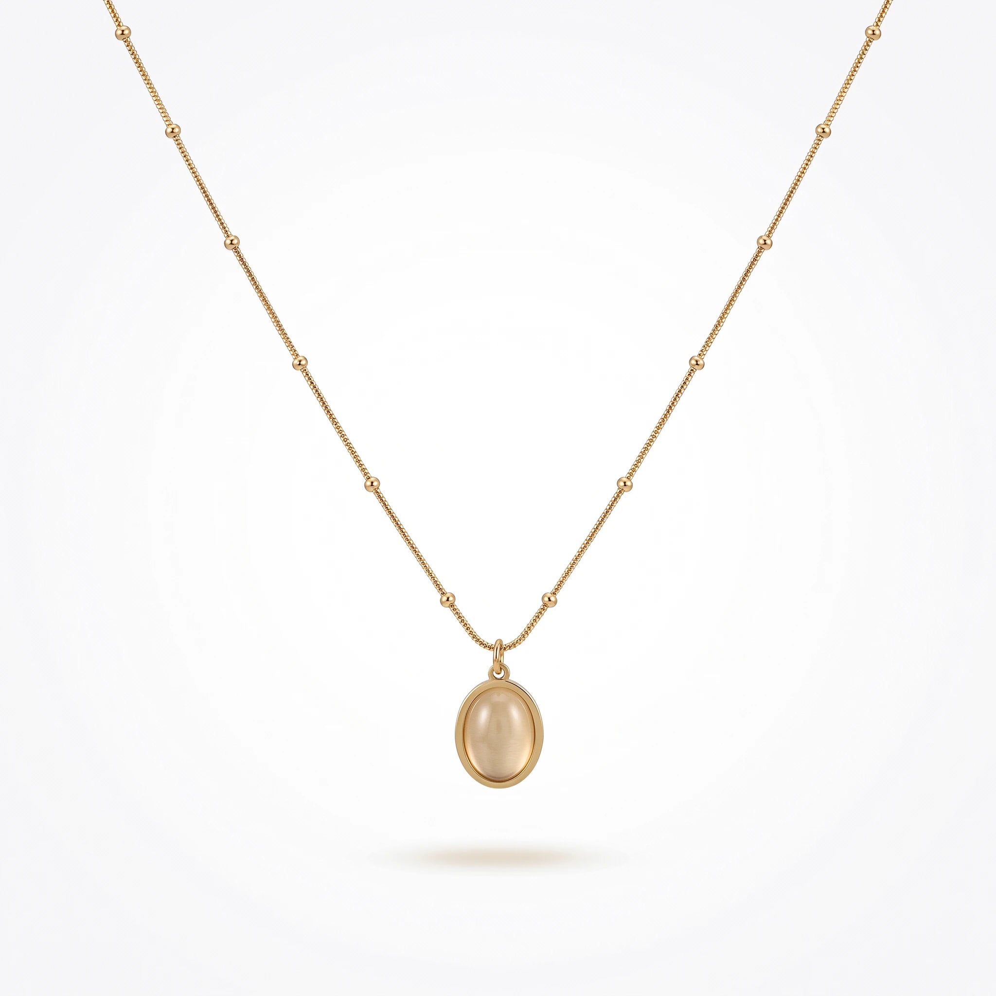 QIAOREN 13510 Dainty Beaded Snake Chain Oval Cream Cat Eye Pendant Necklace, Smooth Gold Frame Natural Stone Necklace