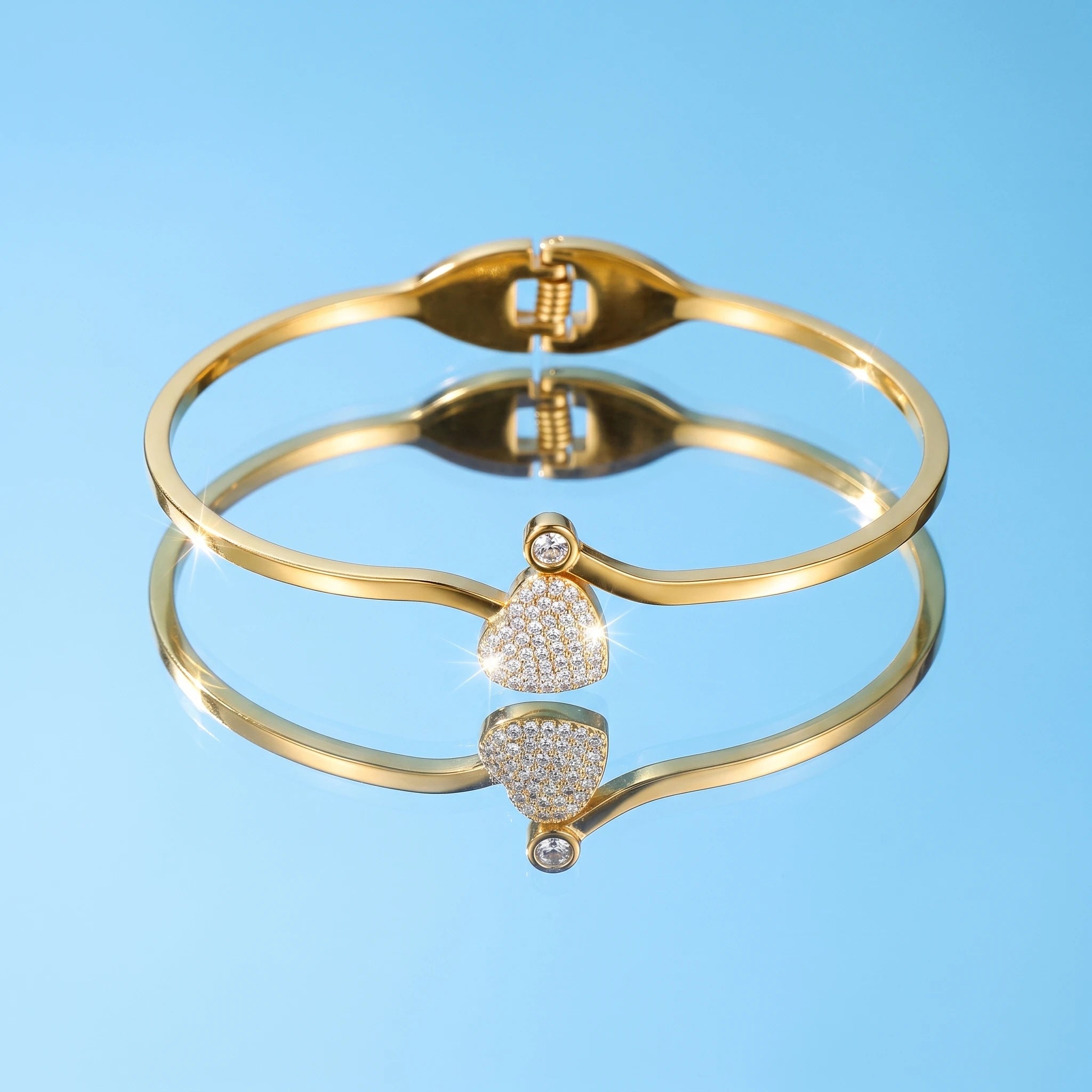 QIAOREN 13653 Thin Wire Spring Cuff Bangle with Paved Zircon Heart & Tiny Single Crystal Dual Charms, Polished Gold Open Bangle