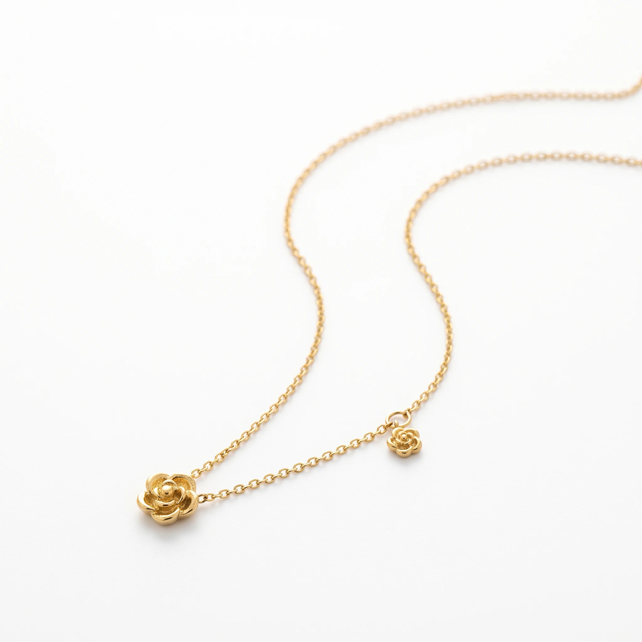 QIAOREN 13743 Thin Cable Chain Necklace with Two Hollow Layered Flower Charms Inlaid Single Round Clear Zircon Jewelry