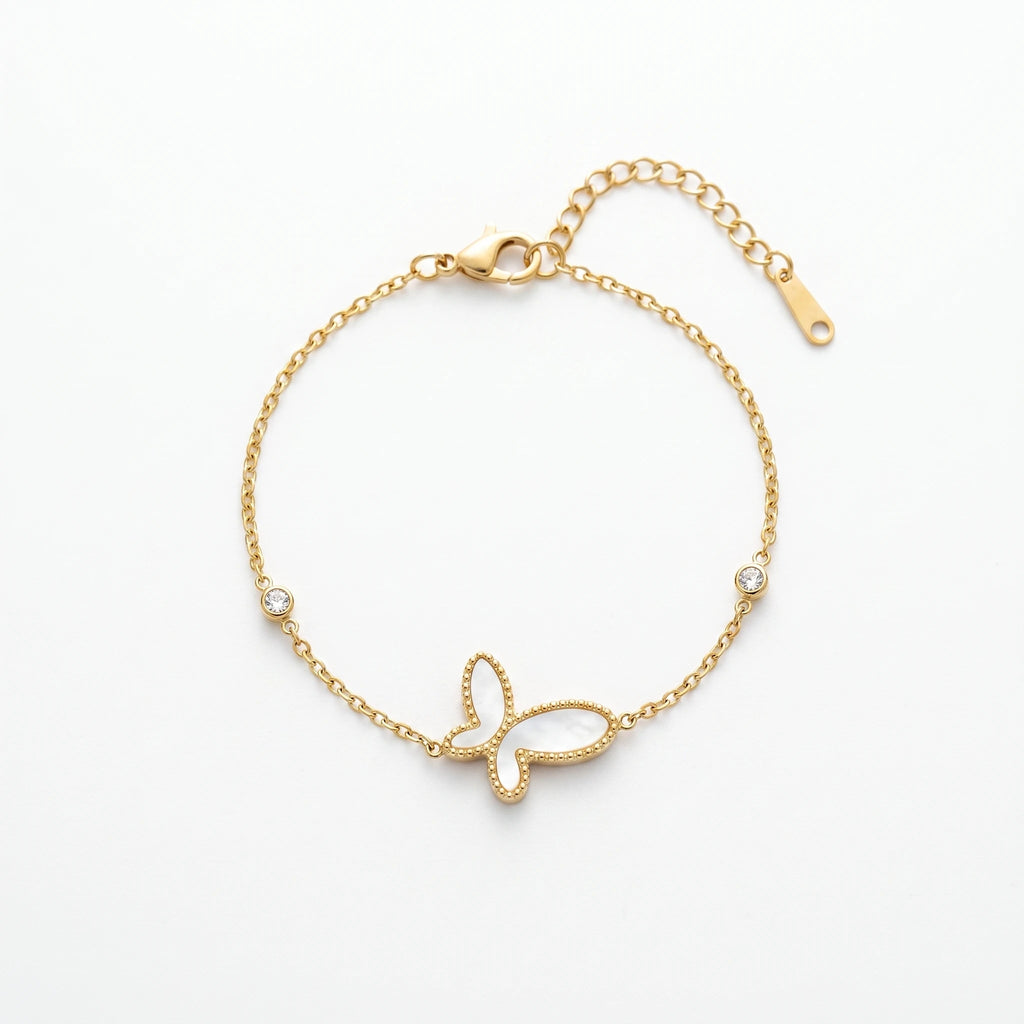 QIAOREN 13767 Thin Oval Link Chain Bracelet with Beaded Border White Mother of Pearl Butterfly Charm & Two Side Round Zircon