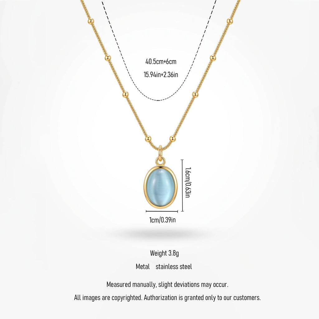 QIAOREN 13477 Dainty Beaded Snake Chain Oval Light Blue Cat Eye Pendant Necklace, Minimalist Cool Tone Necklace