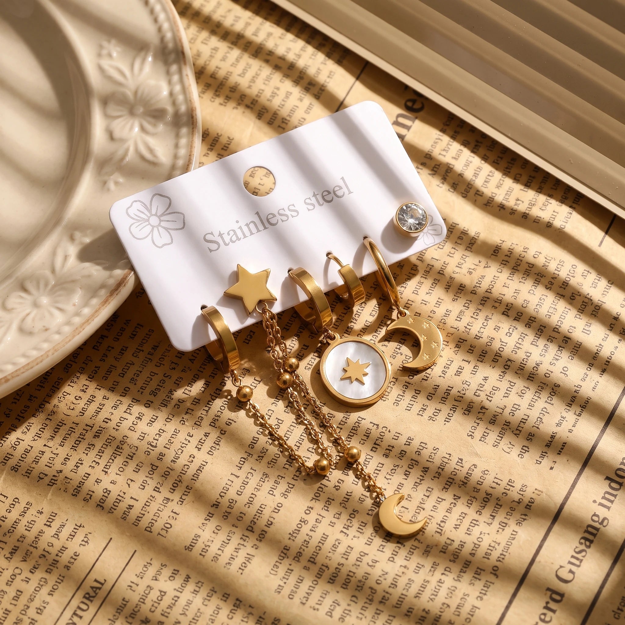 QIAOREN 14477 Stainless Steel Gold Moon Star Dangle Huggie Hoop Earrings Set, Shell Oval Star Pendant Tassel Chain Ear Jewelry