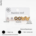 QIAOREN 14465 3 Pair  Gold Stainless Steel Stud Earrings Set, Round Prong CZ, Roman Numeral Disc & Textured Butterfly Studs