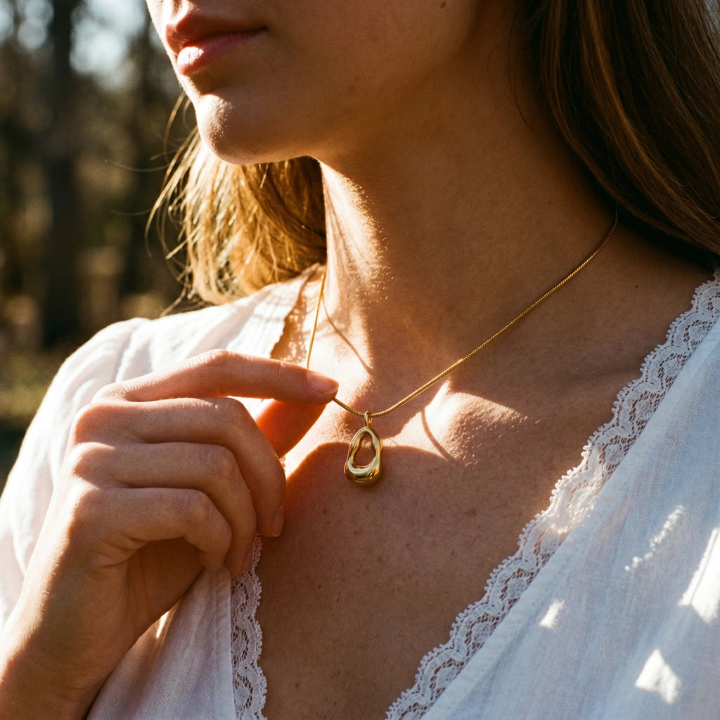 QIAOREN 11071 Stainless Steel Gold Snake Chain Necklace Hollow Irregular Oval Pendant Adjustable Minimalist Women Jewelry Gift