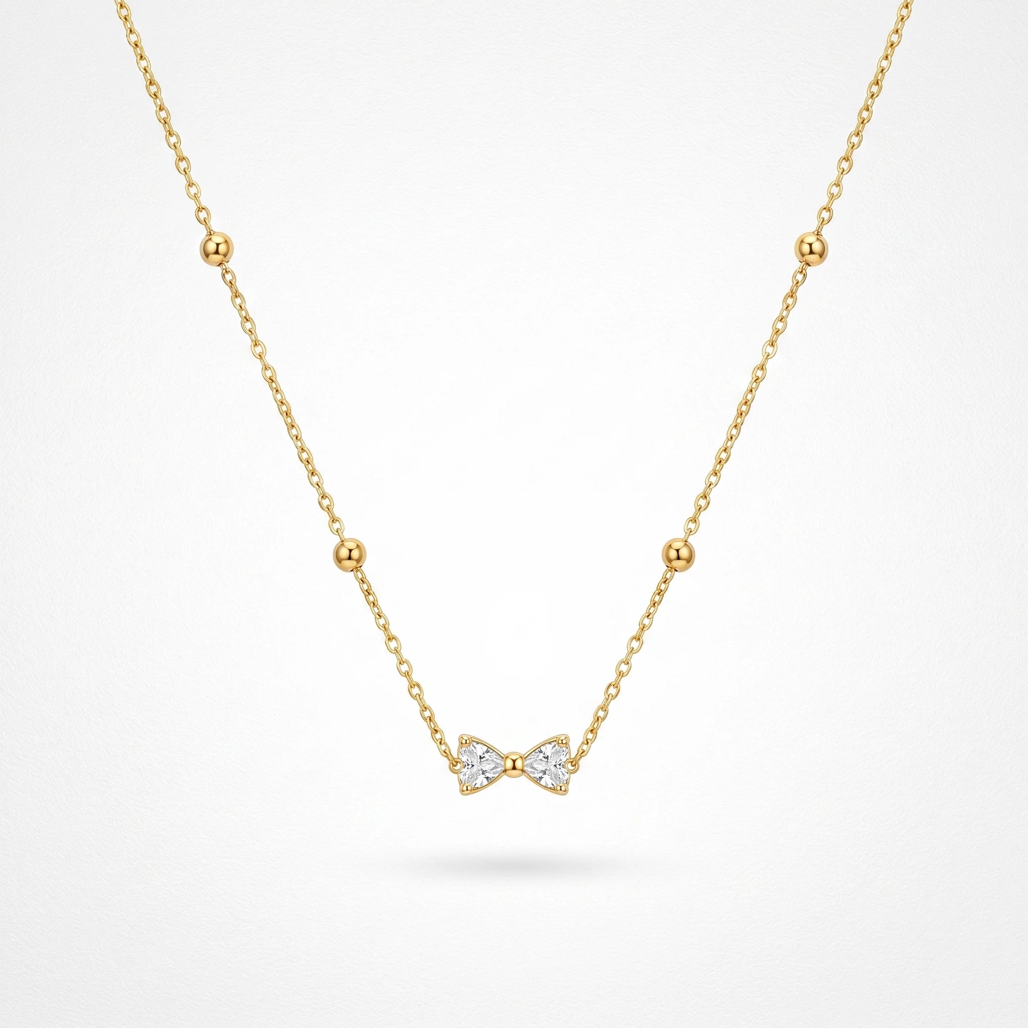 QIAOREN 13509 Dainty Crystal Bow Pendant Station Necklace with Round Beaded Thin Cable Chain, Gold Mini Bowknot CZ Necklace