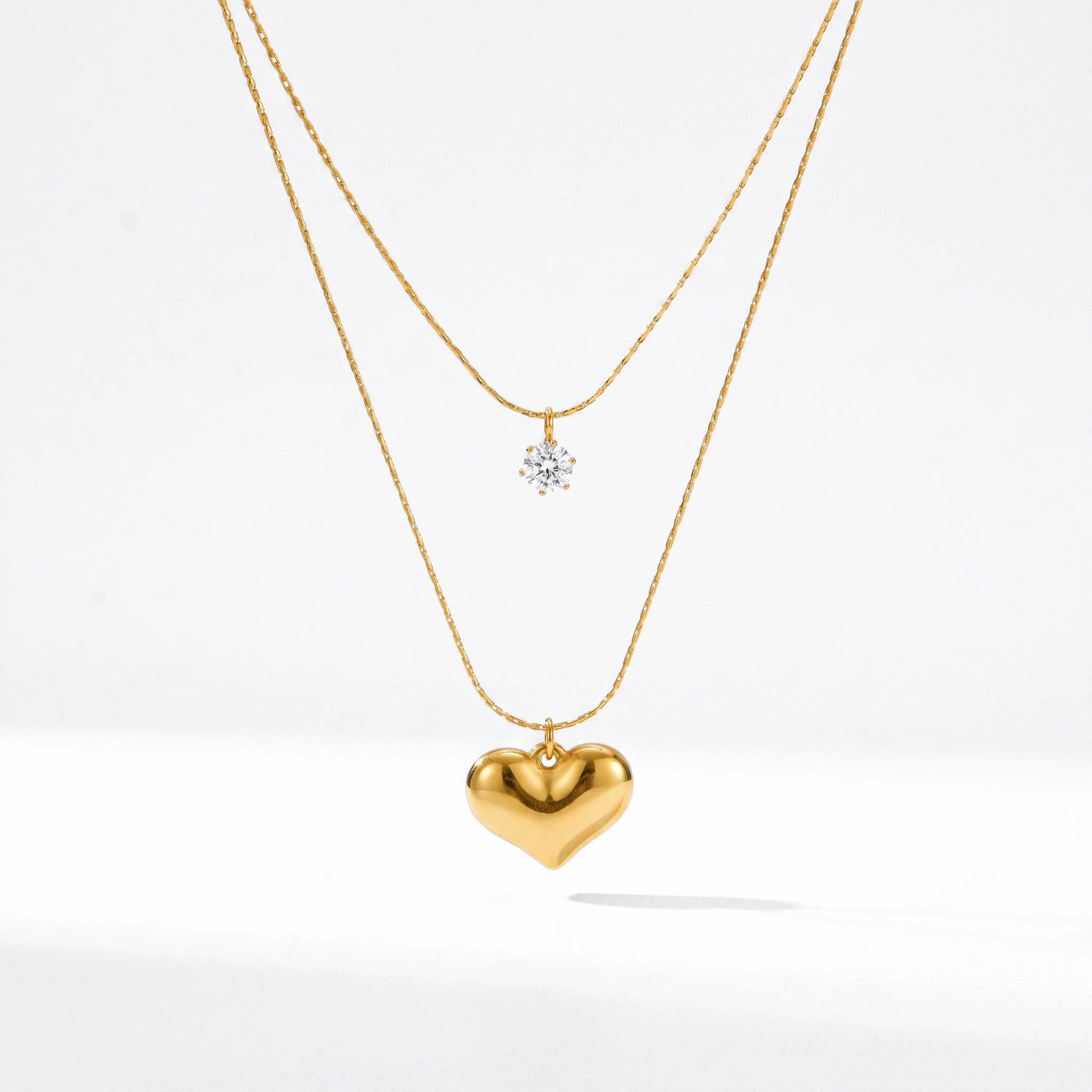 QIAOREN 13481 Dainty Double Layer Snake Chain Necklace with Tiny Round Zircon & Puffy Heart Pendants, Minimalist Layering