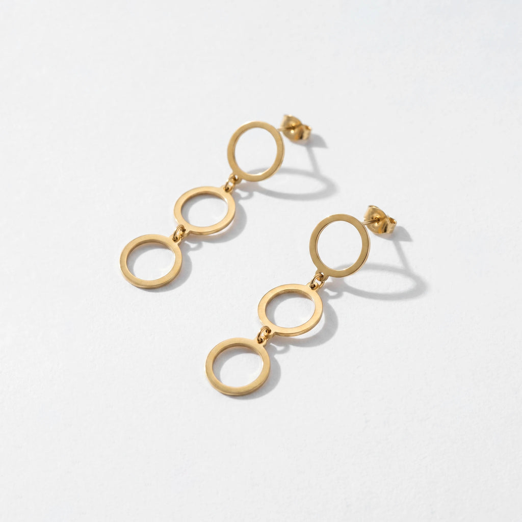 QIAOREN 11856 Trendy Triple Circle Dangle Earrings Stainless Steel Gold Geometric Hollow Ring Drop Earrings for Women US EU