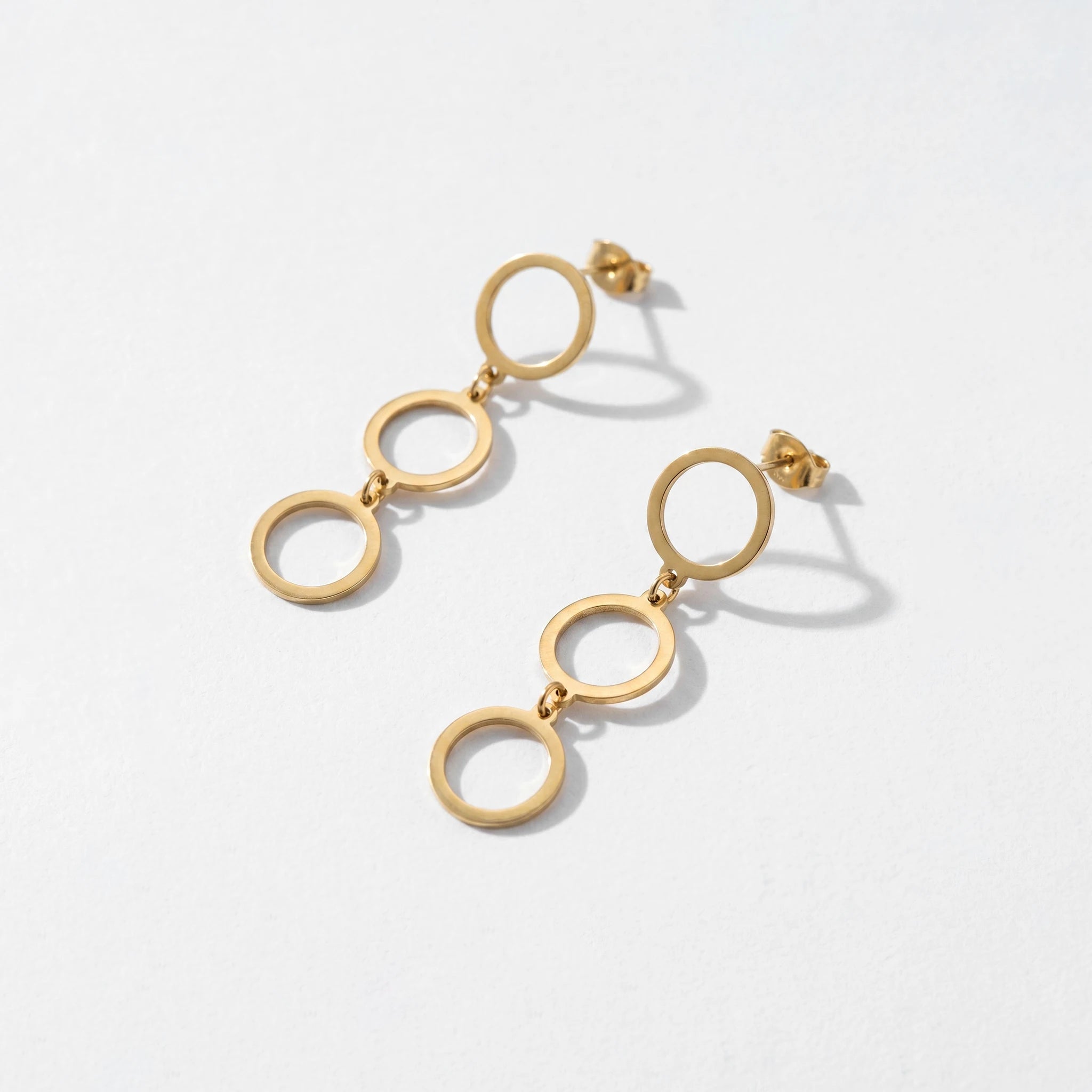 QIAOREN 11856 Trendy Triple Circle Dangle Earrings Stainless Steel Gold Geometric Hollow Ring Drop Earrings for Women US EU